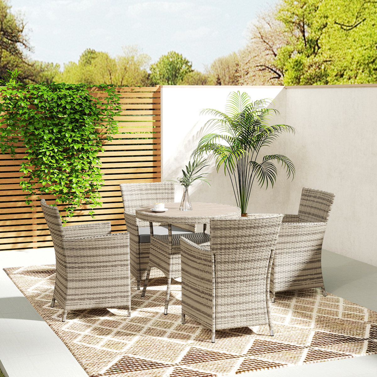 4-Piece Grey Rattan Dining Set with Cushions - Perfect for Outdoor Gatherings