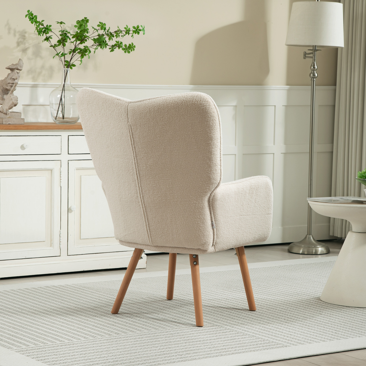 Cream White Wingback Armchair: Stylish Comfort with Cozy Upholstery