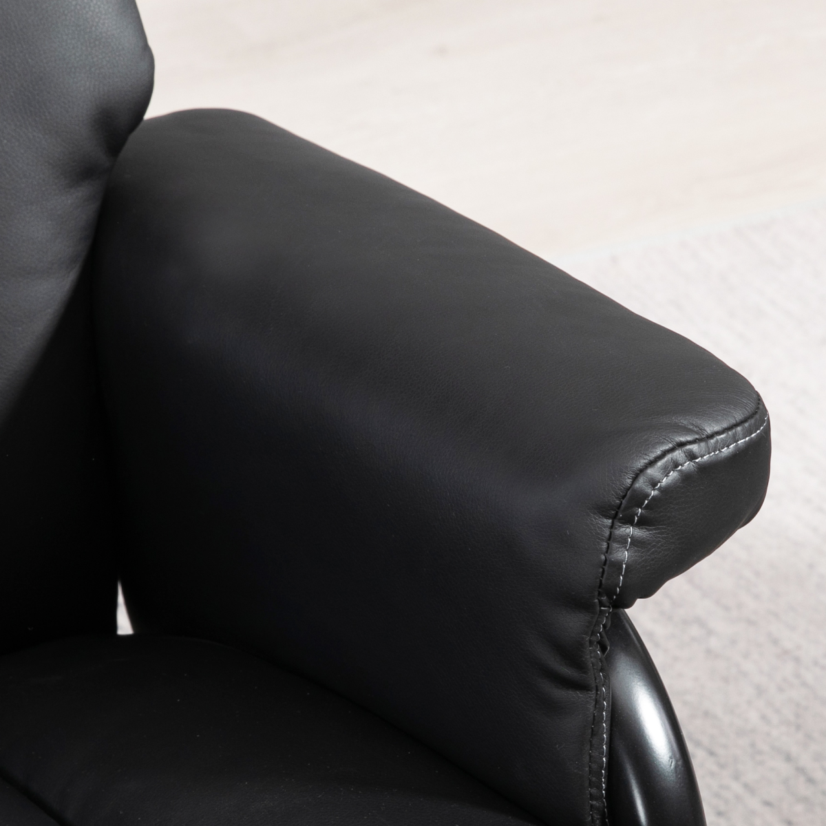 Luxurious Black PU Leather Swivel Recliner & Ottoman for Ultimate Relaxation