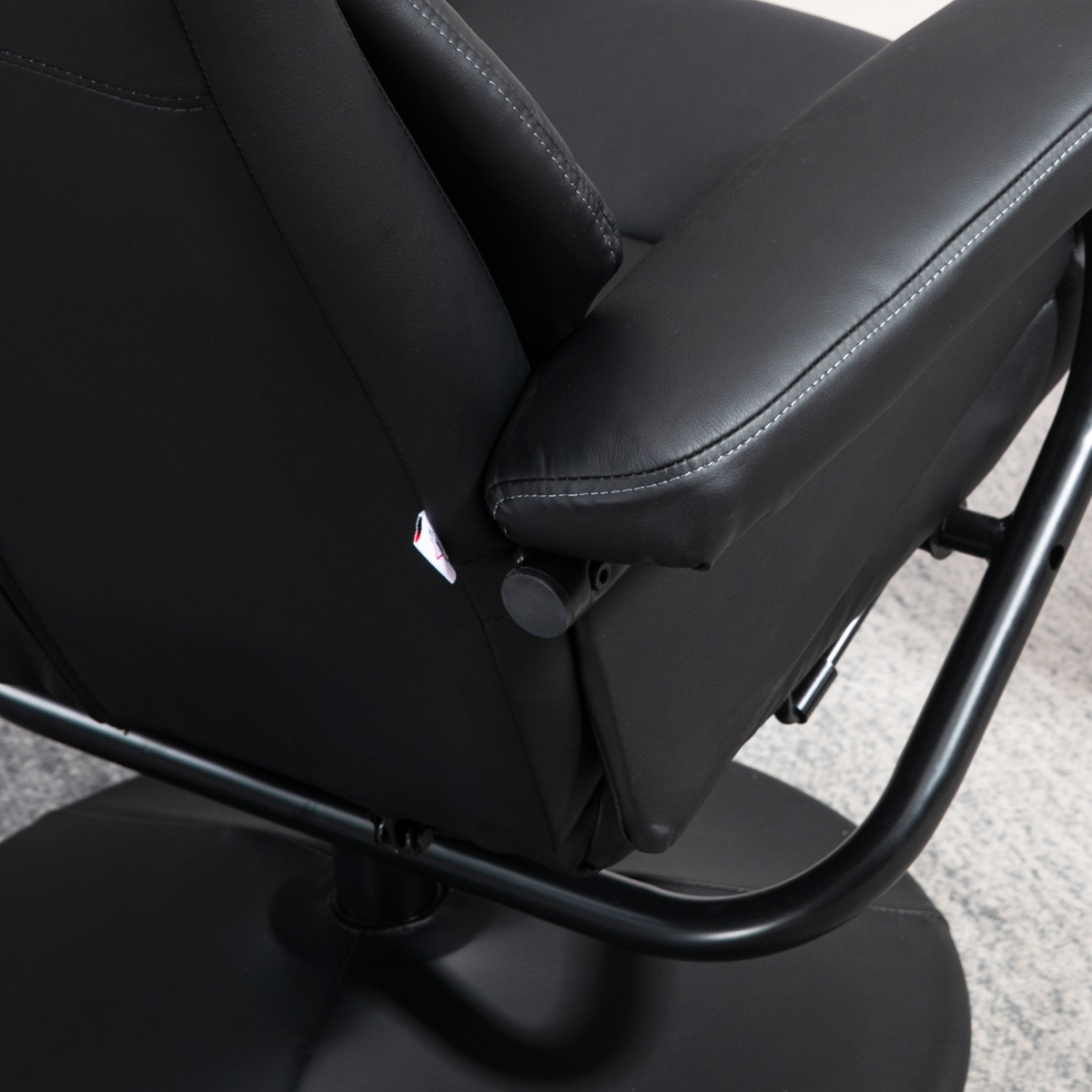Luxurious Black PU Leather Swivel Recliner & Ottoman for Ultimate Relaxation