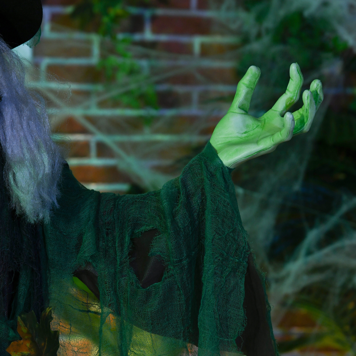 6ft Outdoor Witch Prop with Light-Up Eyes, Waving Arm & Sounds