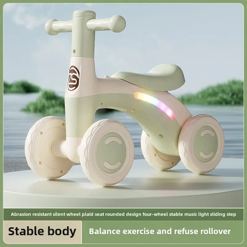 Anti-Tip Baby Balance Bike Ages 1-3 4-Wheel Silent Glider Walker Training Ride-On with Safety Wheels