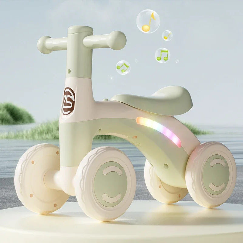 Anti-Tip Baby Balance Bike Ages 1-3 4-Wheel Silent Glider Walker Training Ride-On with Safety Wheels