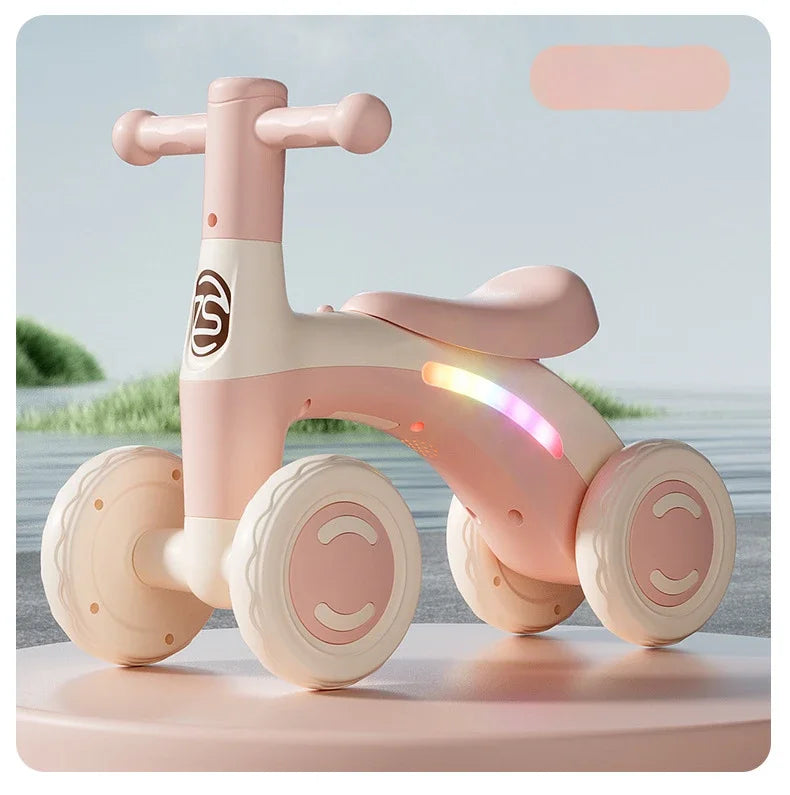 Anti-Tip Baby Balance Bike Ages 1-3 4-Wheel Silent Glider Walker Training Ride-On with Safety Wheels