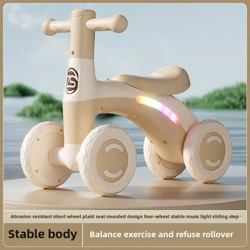 Anti-Tip Baby Balance Bike Ages 1-3 4-Wheel Silent Glider Walker Training Ride-On with Safety Wheels