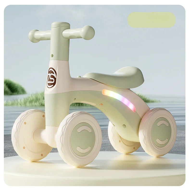 Anti-Tip Baby Balance Bike Ages 1-3 4-Wheel Silent Glider Walker Training Ride-On with Safety Wheels