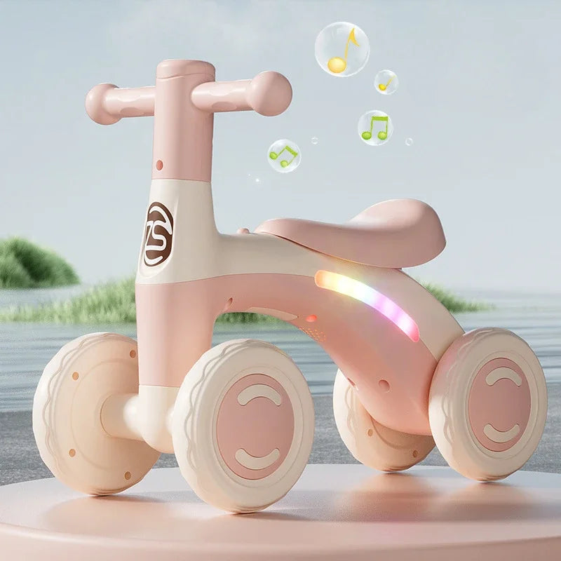 Anti-Tip Baby Balance Bike Ages 1-3 4-Wheel Silent Glider Walker Training Ride-On with Safety Wheels